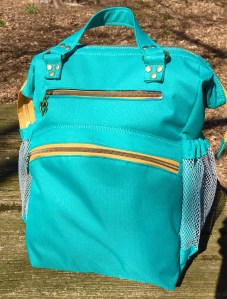 A diaper bag that was made from water-resistant canvas.